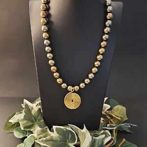 Gold Metallic Beaded Necklace with Spiral Pendant